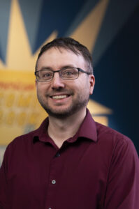 Shane Rhinewald photo, maroon shirt 