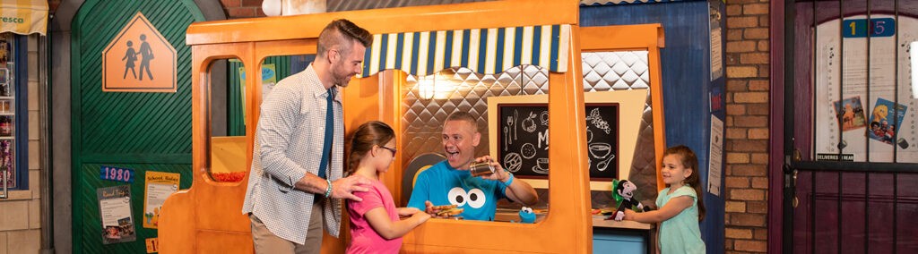 Family at Cookie Monster's foodie truck